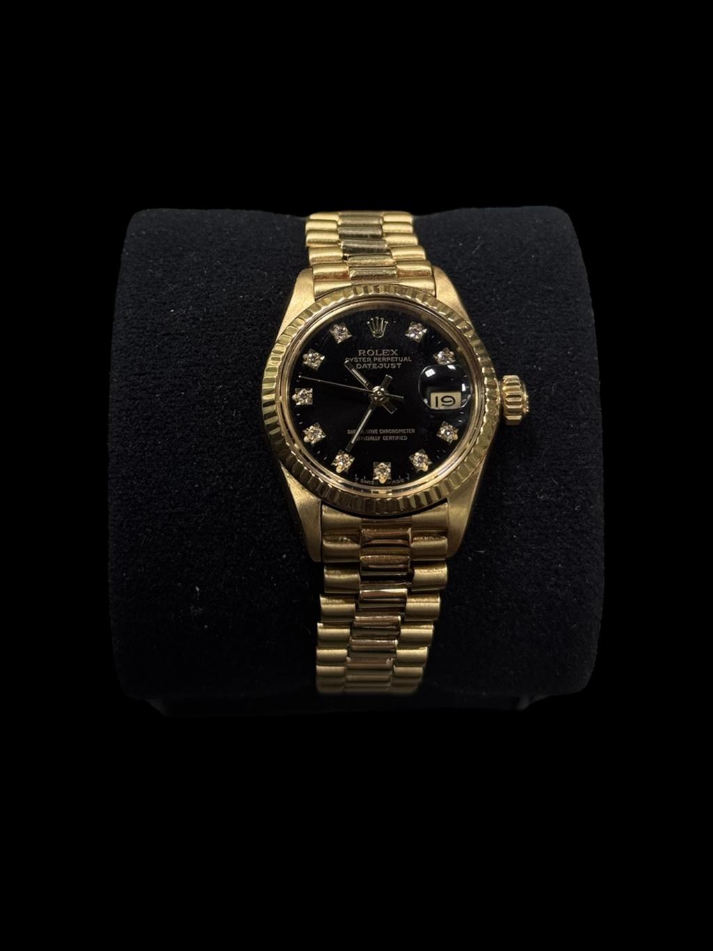 ROLEX LADY DATEJUST 18K YELLOW GOLD 26MM BLACK DIAL WITH DIAMOND MARKERS